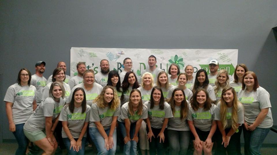 Manhattan Kansas Green Champion Teachers posing in their matching t-shirts for a picture